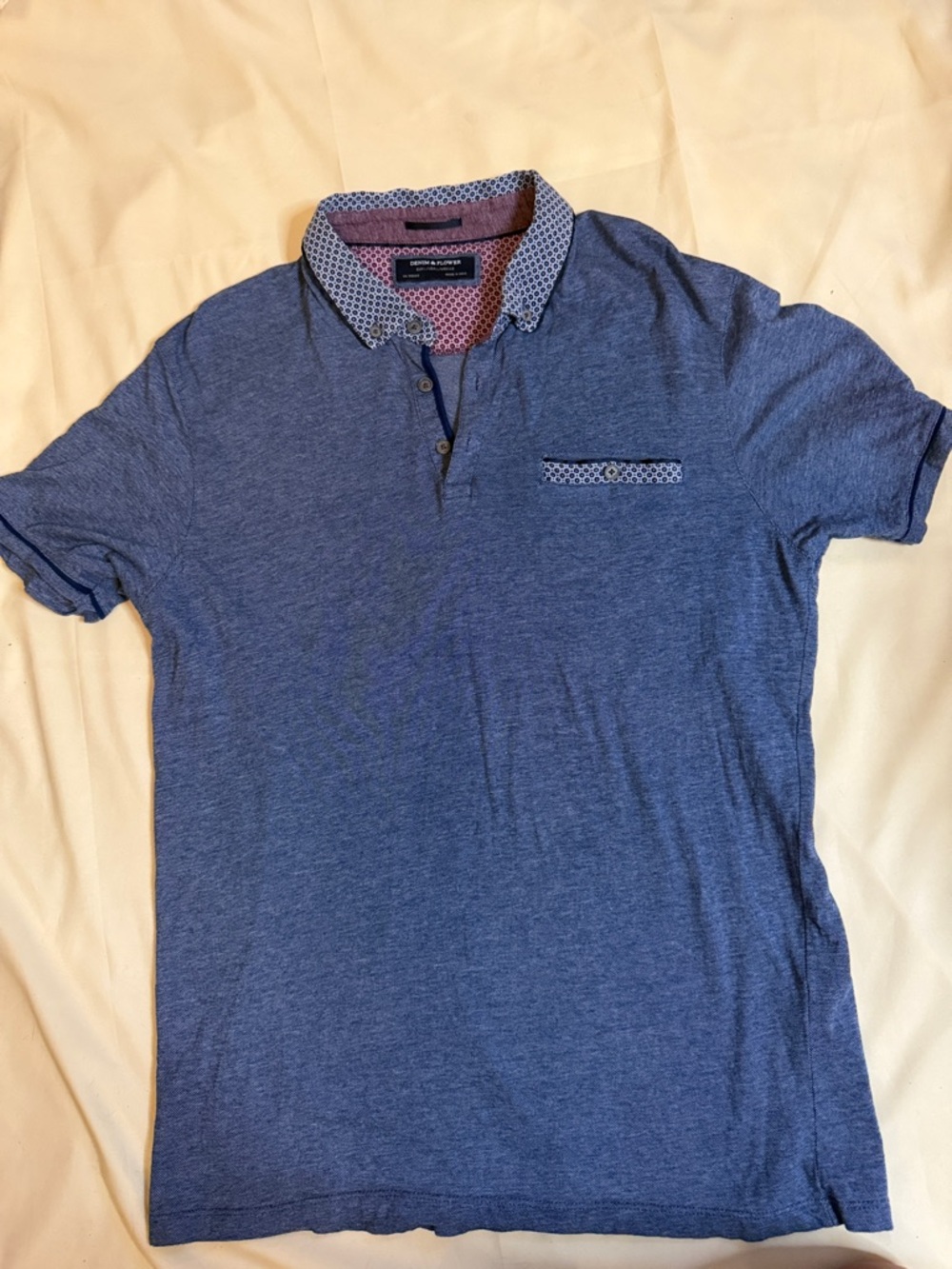Men's Blue Polo Shirt with Patterned Trim